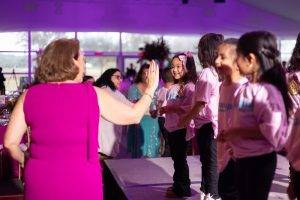 04 dawn montecalvo (left) high fives student performers at elevate